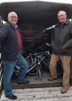 Mike McNeice and John Perry load up bikes for Bike Aid Africa